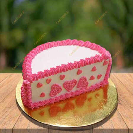 half designed pink cake